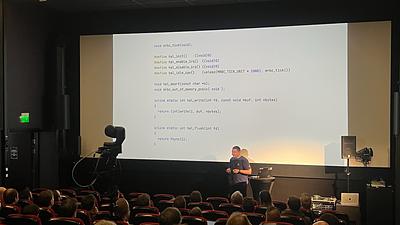 Chris presenting with code on the screen