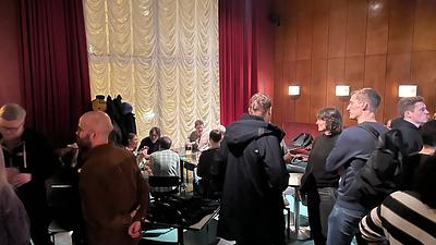 Attendees mingling at the afterparty