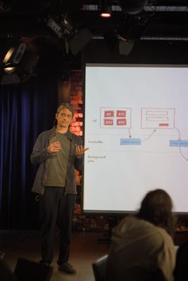 Ismael with a diagram slide on screen
