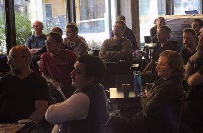 Attendees listening to a talk