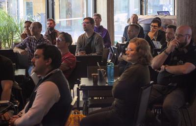 Attendees listening to the Unicode talk