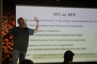 Stephan presenting a slide on NFC vs NFD normalisation